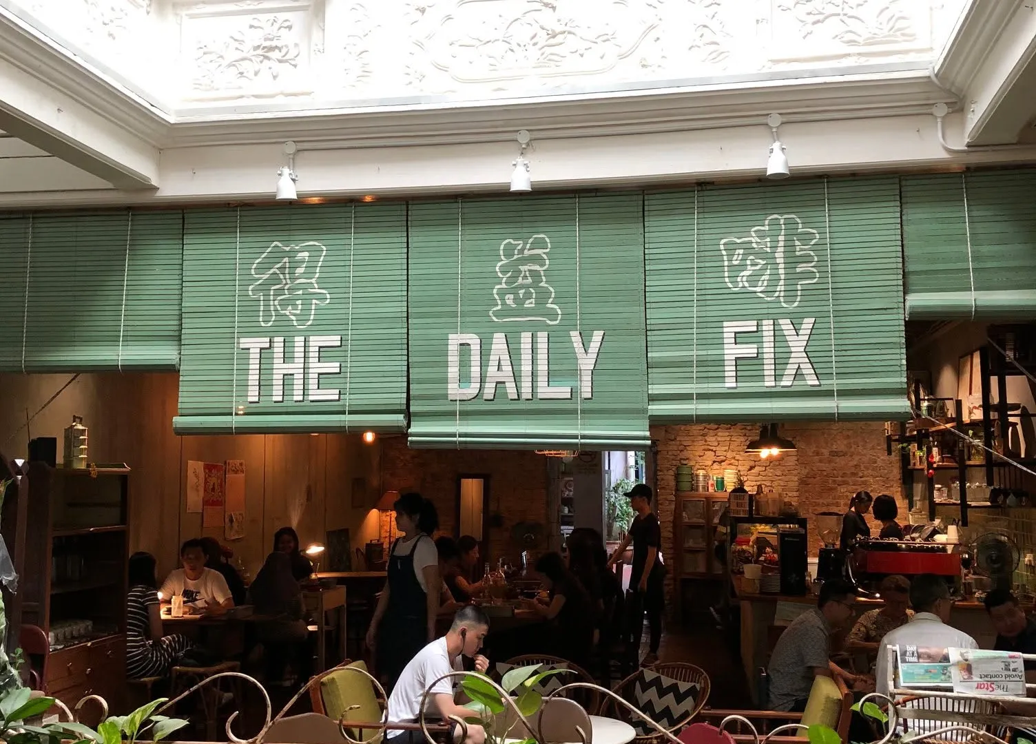 The Daily Fix Cafe interior and courtyard seating in Melaka