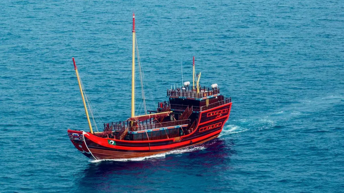 Fu Ning: A Majestic Wooden Sailboat Docks in Melaka