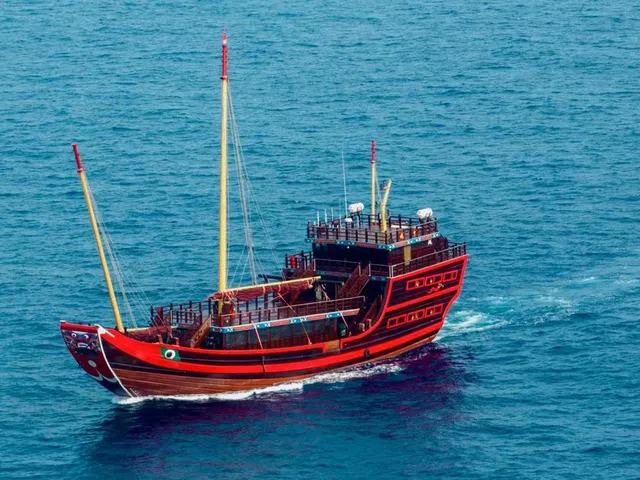 Fu Ning: A Majestic Wooden Sailboat Docks in Melaka